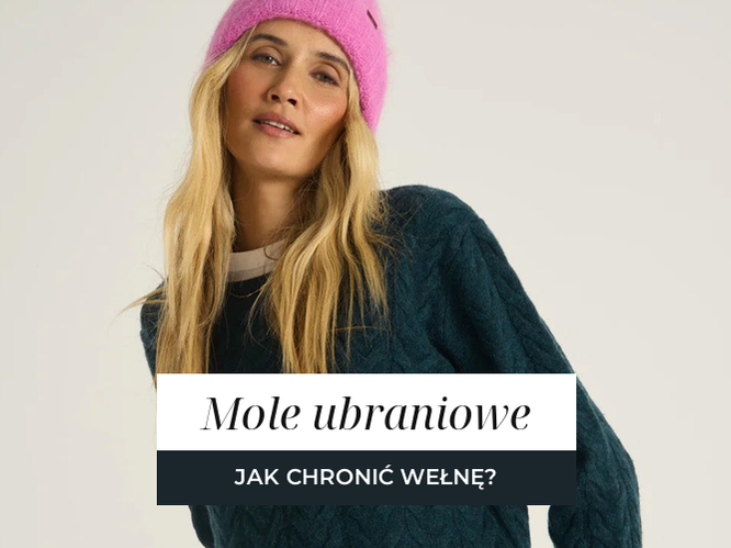 Ciemnozielony wełniany sweter o splocie warkoczowym