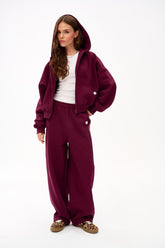 Szerokie spodnie dresowe Boarding Soon