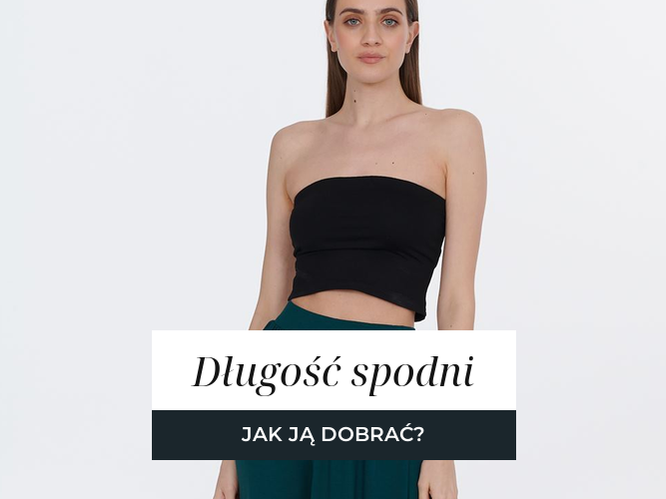 Szerokie spodnie w ciemnej zieleni, widoczna długość nogawki
